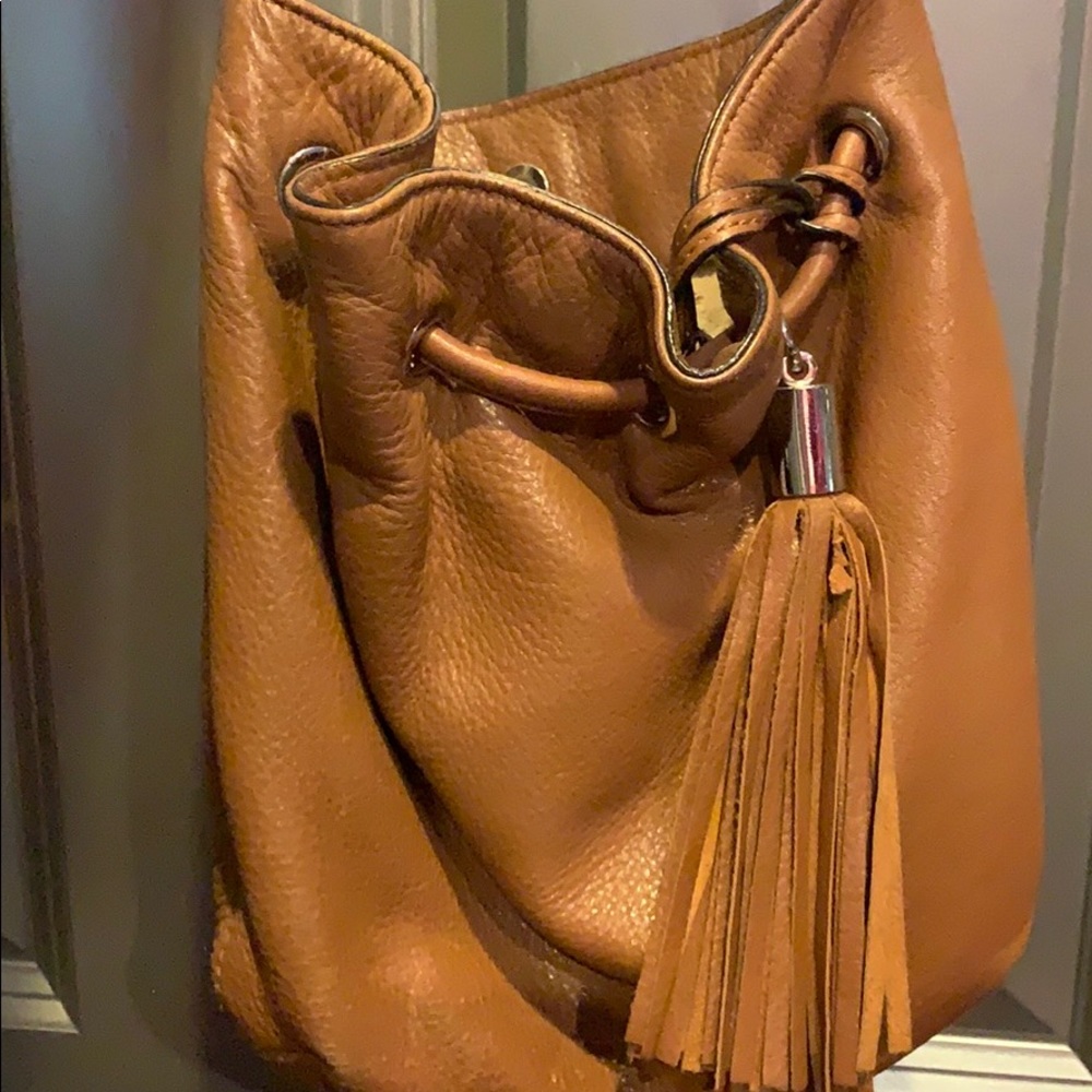 Tan  crossbody bad great condition